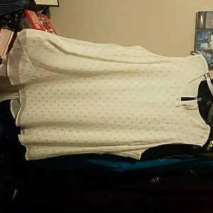 White and gold sleeveless blouse